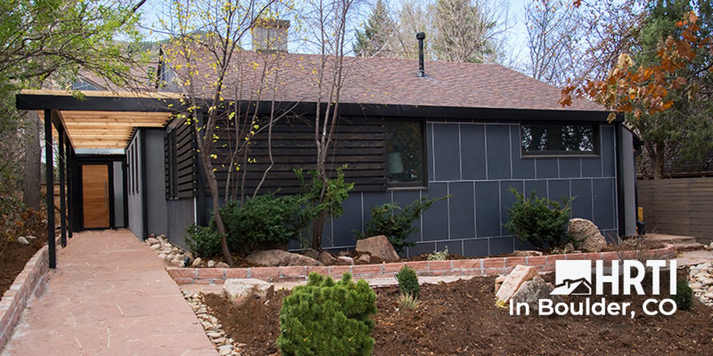 Boulder home with panel and channel siding and new roof